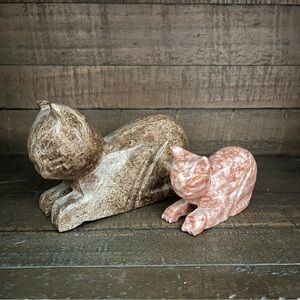 Hand carved stone cats